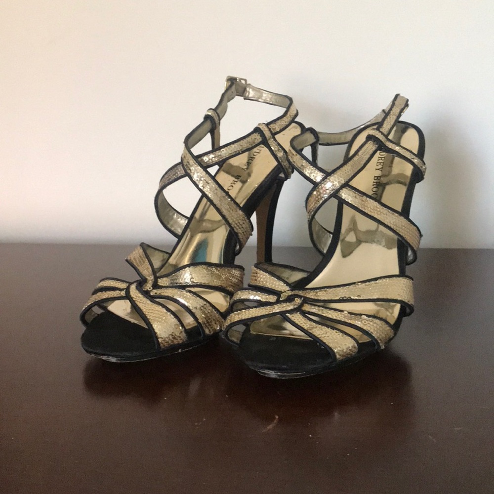 Black satin and gold strappy heels